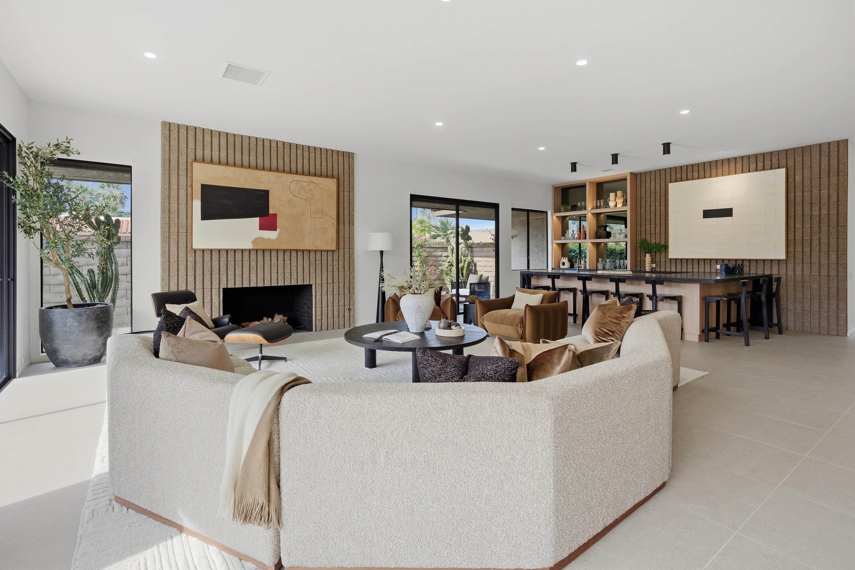 14 Rutgers Court Rancho Mirage, CA 92270 - Photo 30 of 59 a living room with fireplace furniture and a flat screen tv