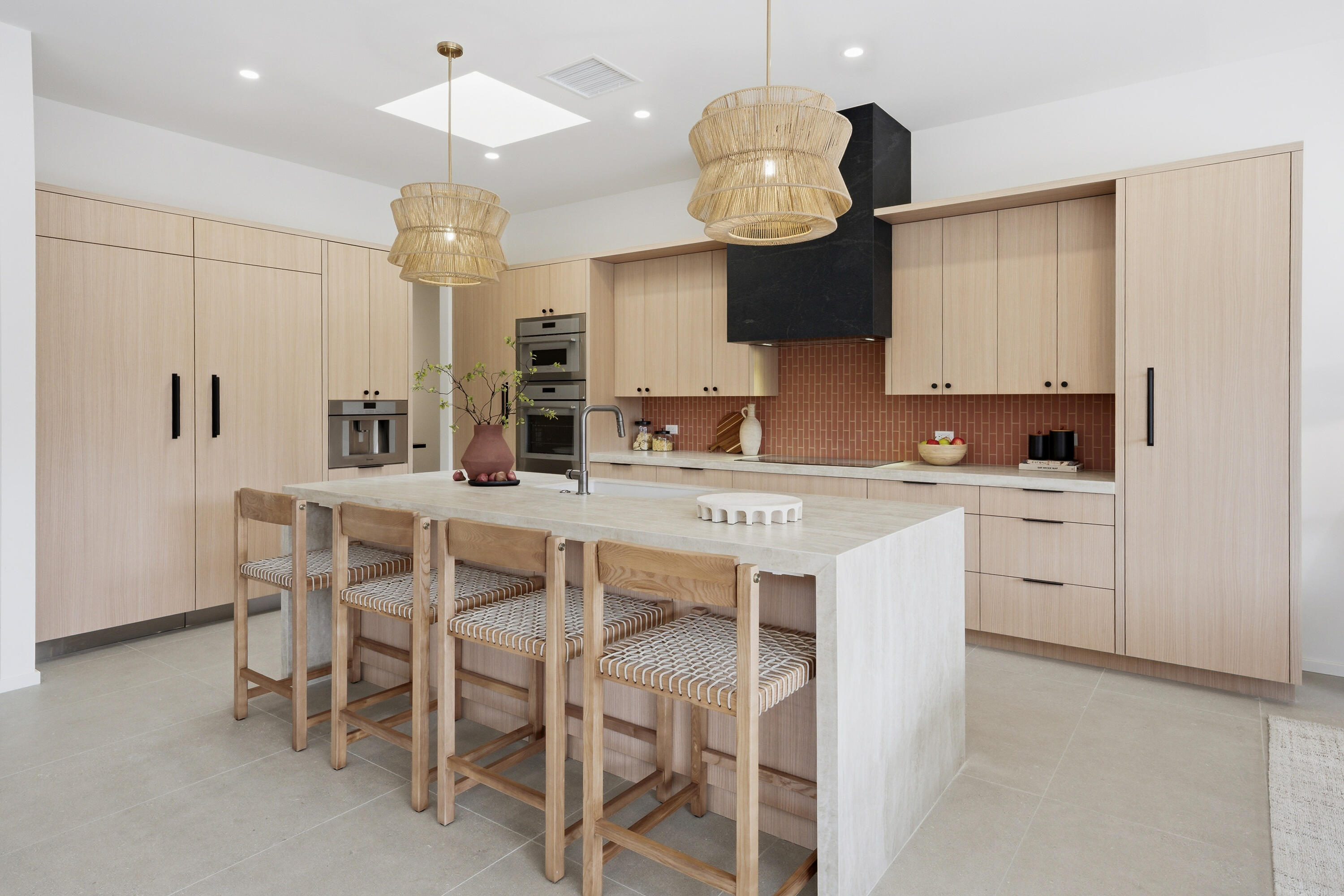 14 Rutgers Court Rancho Mirage, CA 92270 - Photo 37 of 59 a kitchen with cabinets a sink stainless steel appliances and dining table