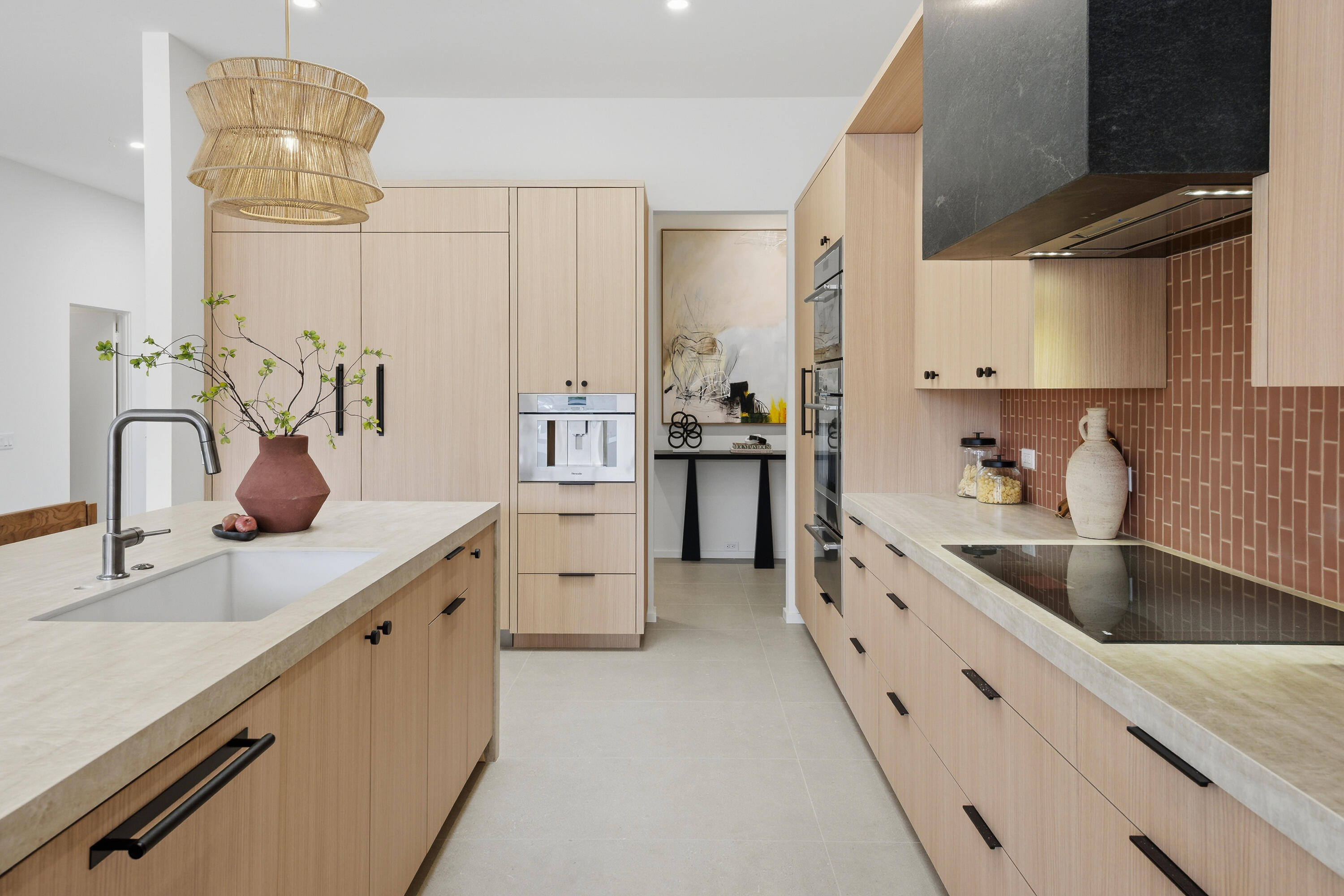 14 Rutgers Court Rancho Mirage, CA 92270 - Photo 38 of 59 a kitchen with kitchen island granite countertop a sink stainless steel appliances and cabinets