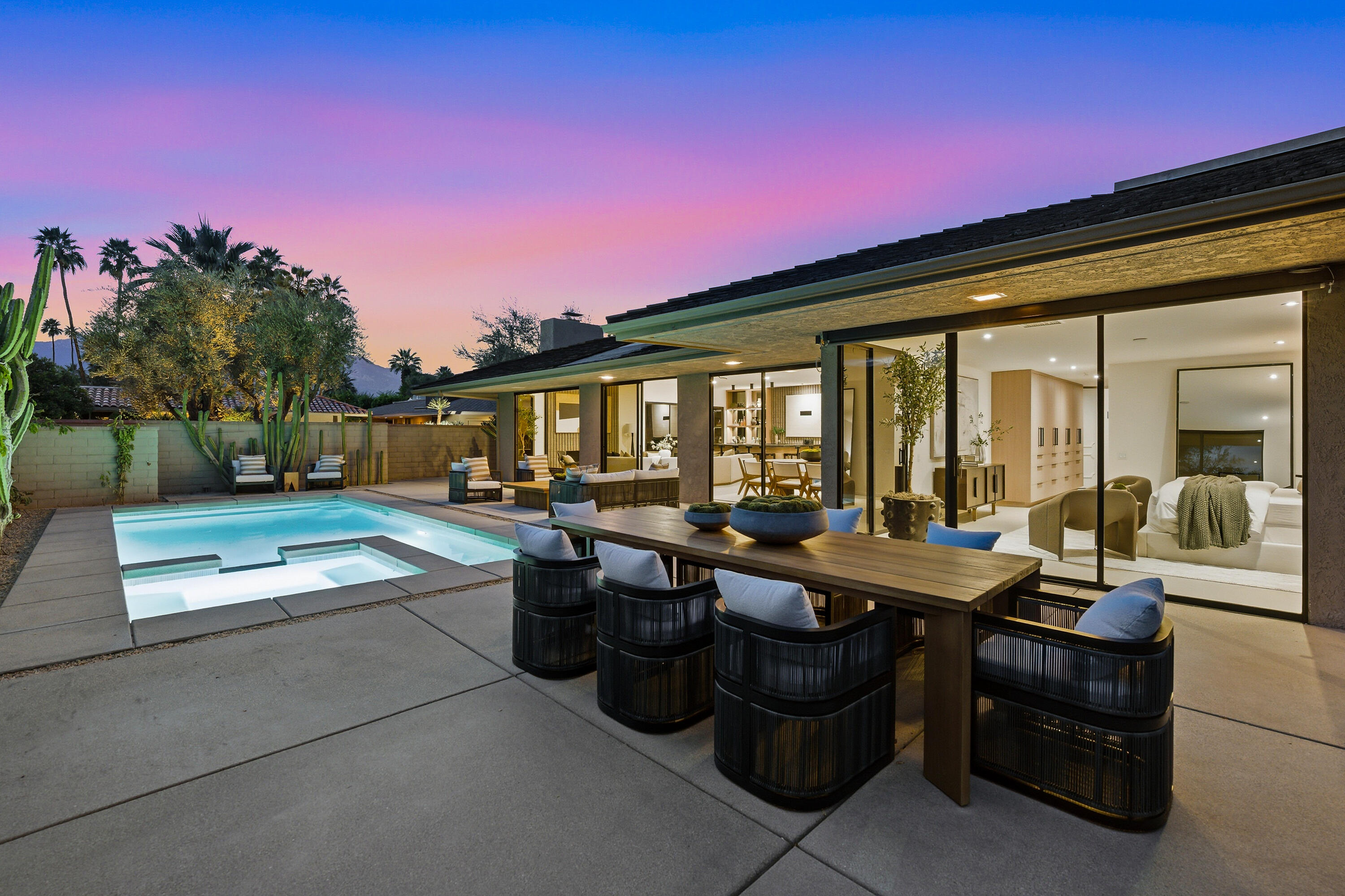 14 Rutgers Court Rancho Mirage, CA 92270 - Photo 4 of 59 a view of a patio with swimming pool and sitting area