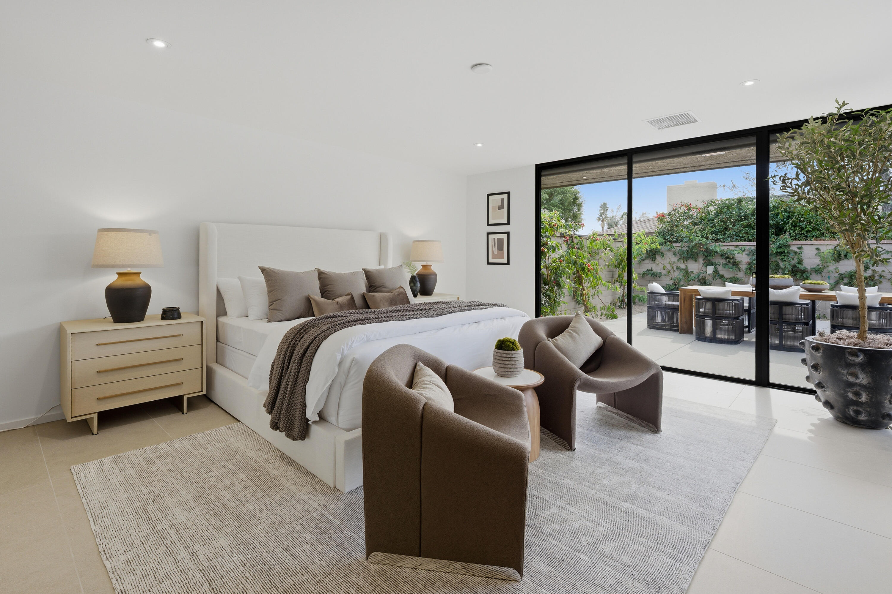 14 Rutgers Court Rancho Mirage, CA 92270 - Photo 46 of 59 a bedroom with a bed and large window