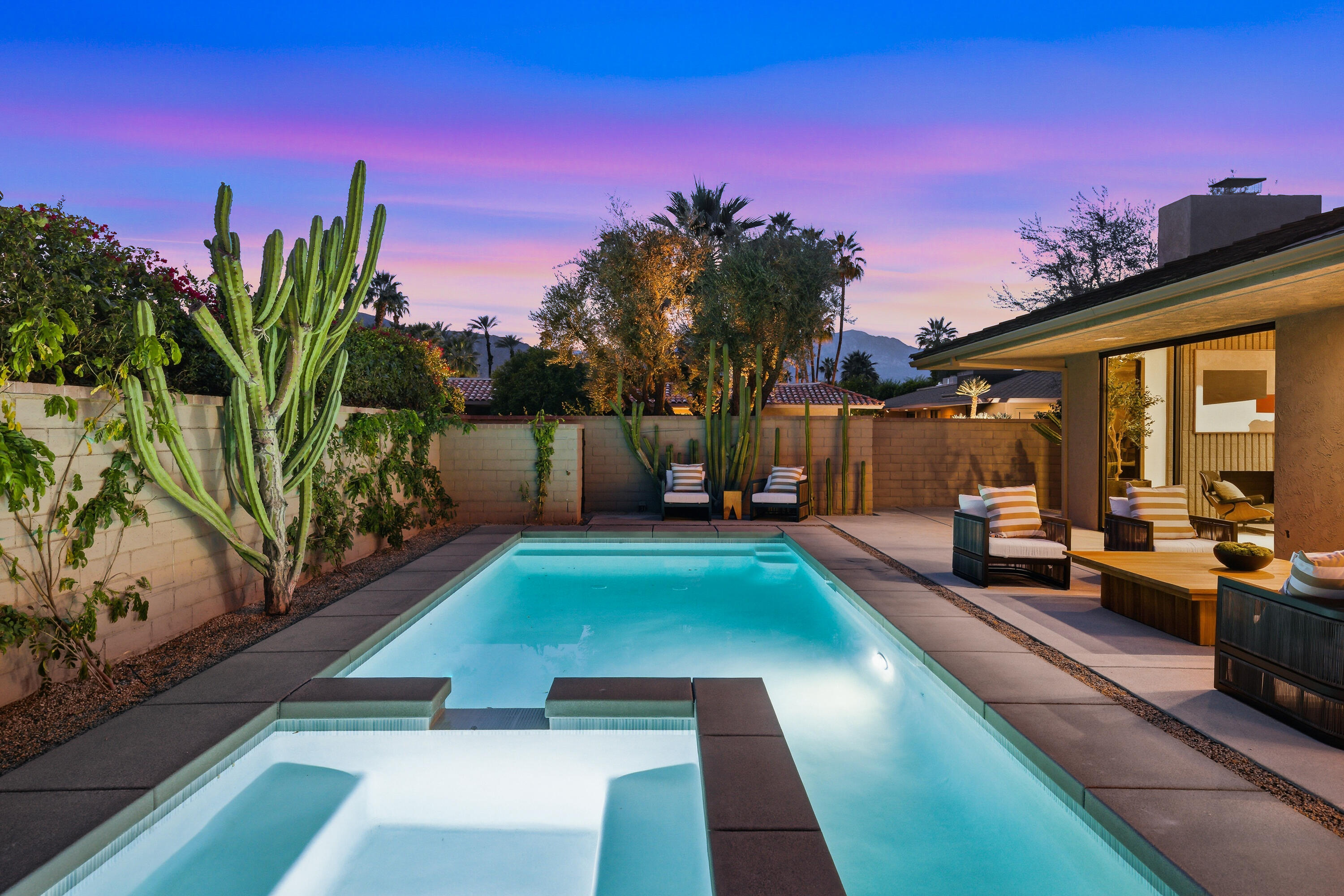 14 Rutgers Court Rancho Mirage, CA 92270 - Photo 5 of 59 a swimming pool with outdoor seating and yard