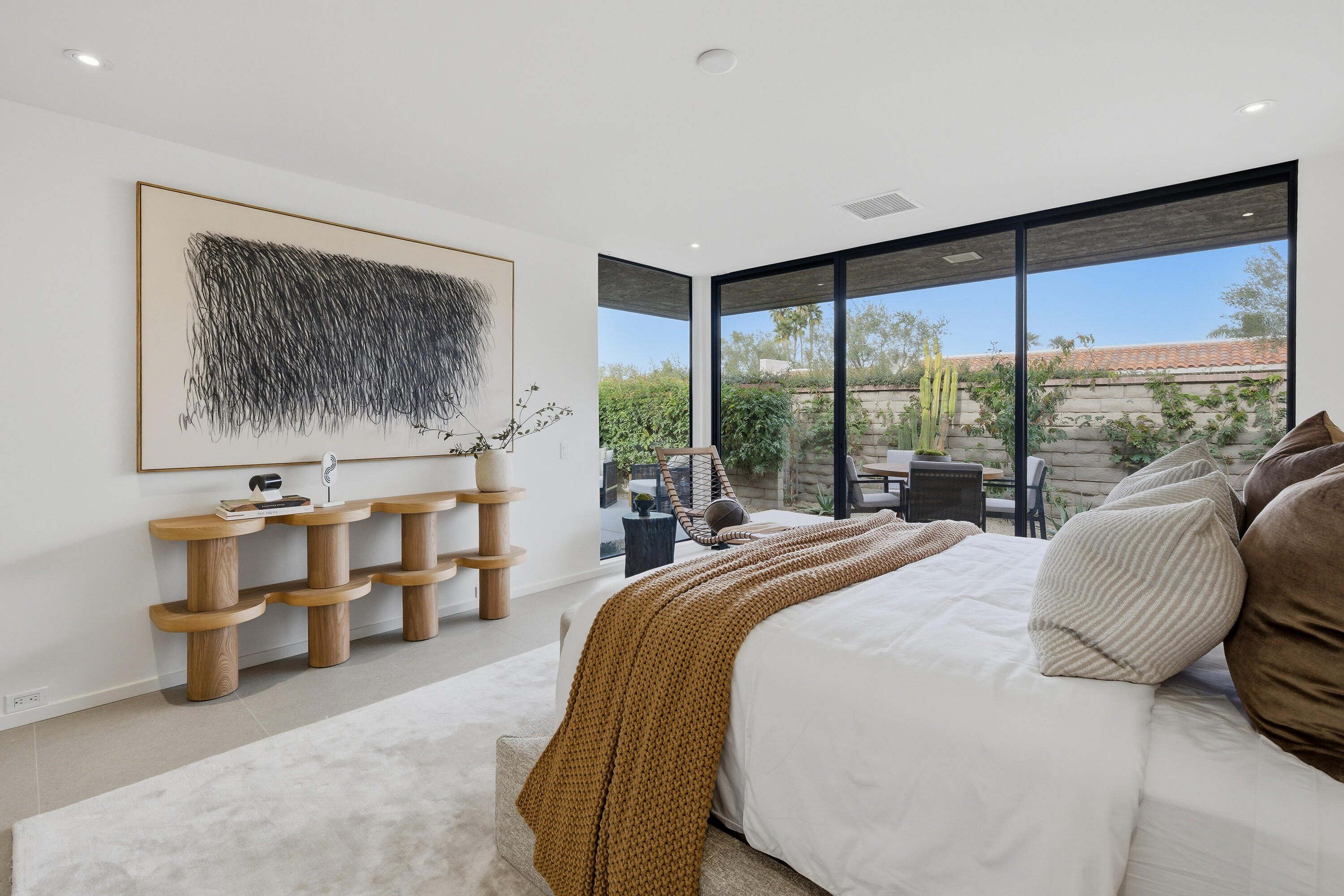 14 Rutgers Court Rancho Mirage, CA 92270 - Photo 51 of 59 a bed sitting in a bedroom next to a window