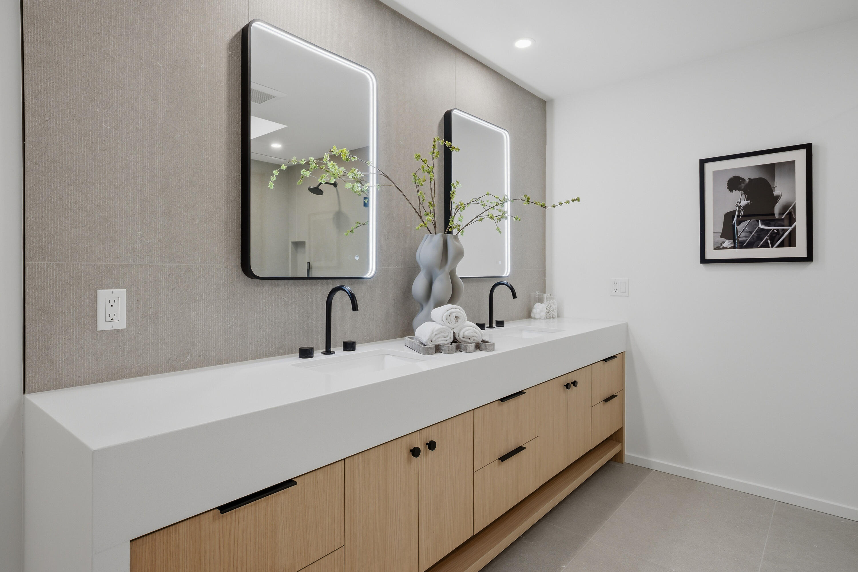 14 Rutgers Court Rancho Mirage, CA 92270 - Photo 52 of 59 a bathroom with a double vanity sink and a mirror