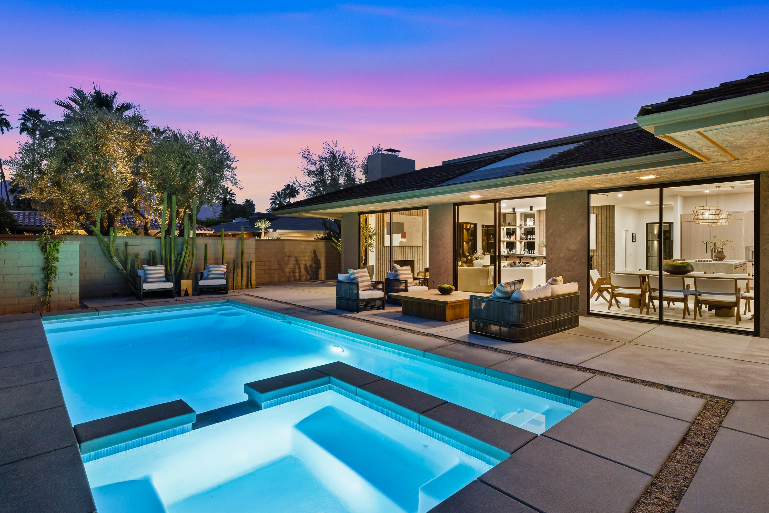14 Rutgers Court Rancho Mirage, CA 92270 - Photo 6 of 59 a view of a patio with swimming pool table and chairs