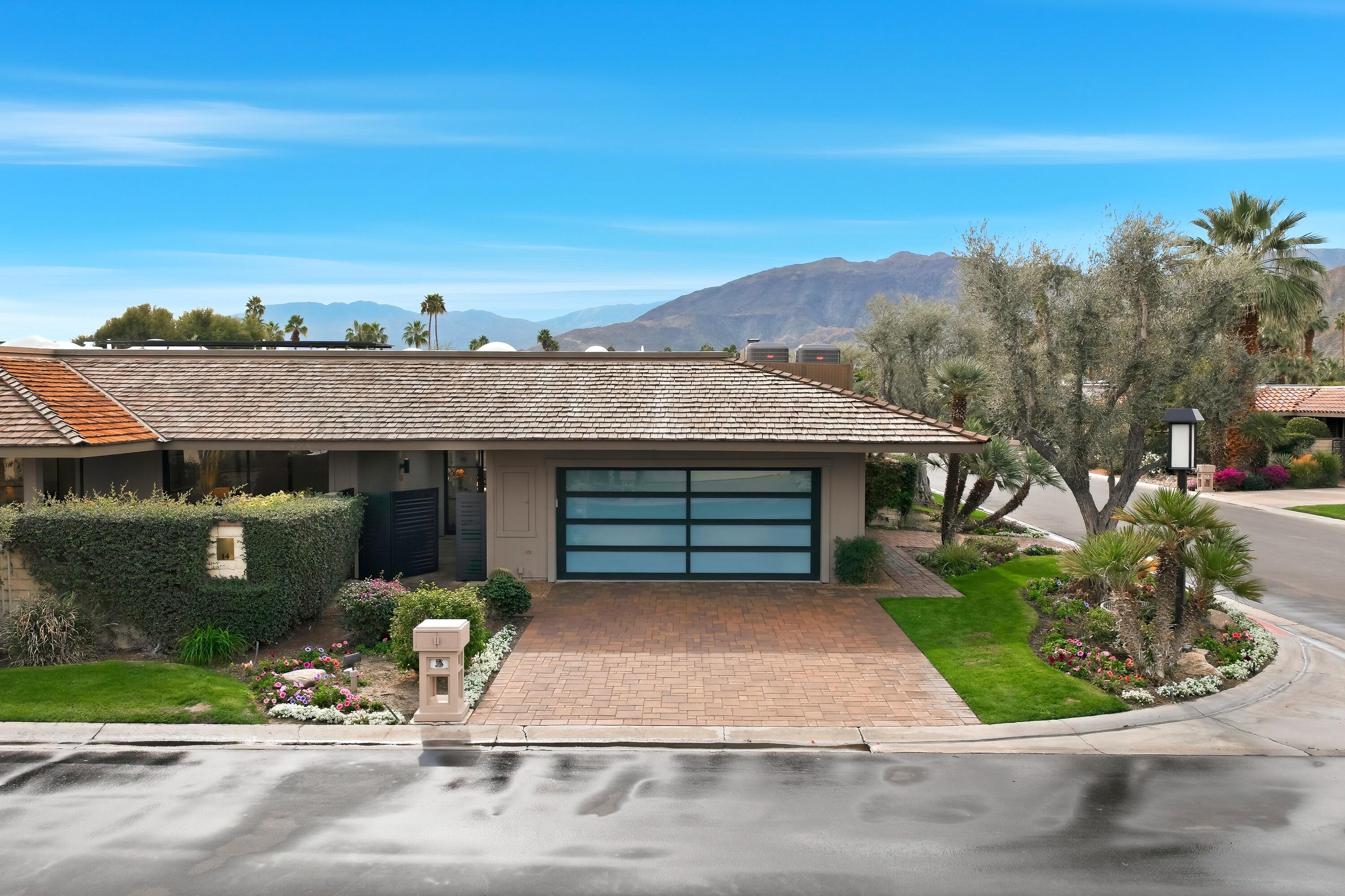 14 Rutgers Court Rancho Mirage, CA 92270 - Photo 8 of 59 front view of a house with a garage