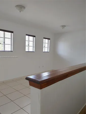 a room with a table and a window