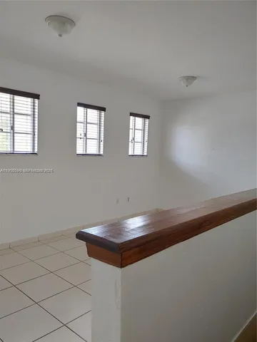 a room with a table and a window