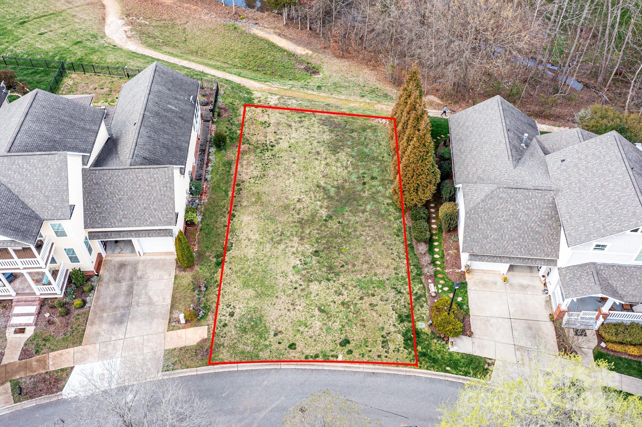 111 Poppy Field Lane Davidson, NC 28115 - Photo 2 of 28 an aerial view of a house with a garden and balcony