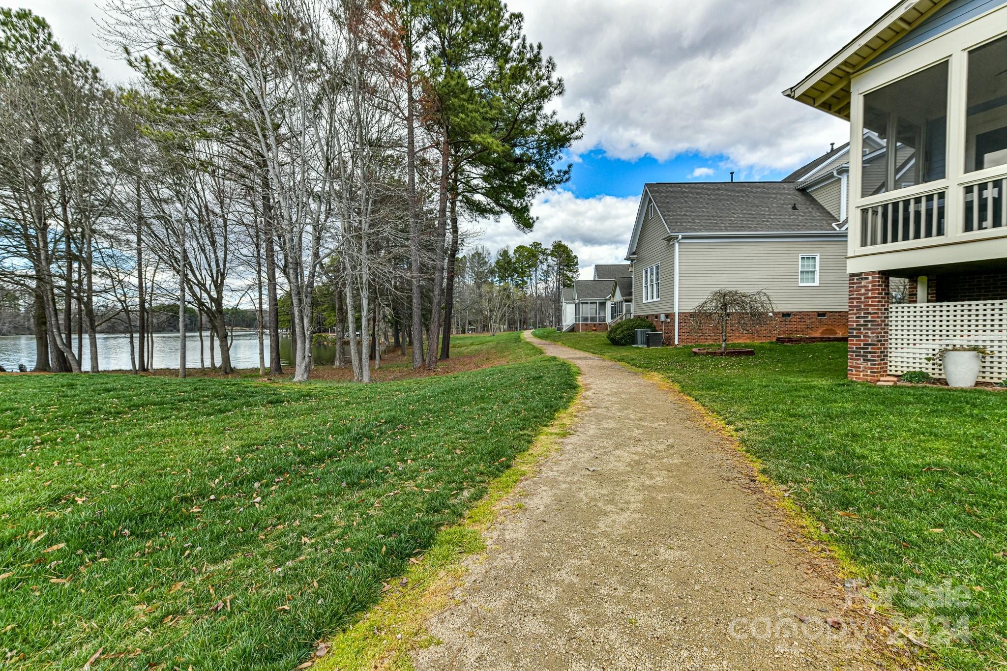 111 Poppy Field Lane Davidson, NC 28115 - Photo 24 of 28 a view of a house with a yard
