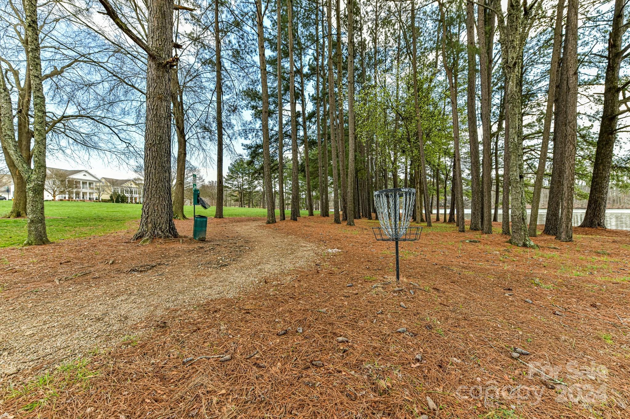 111 Poppy Field Lane Davidson, NC 28115 - Photo 26 of 28 a house with trees in front of it