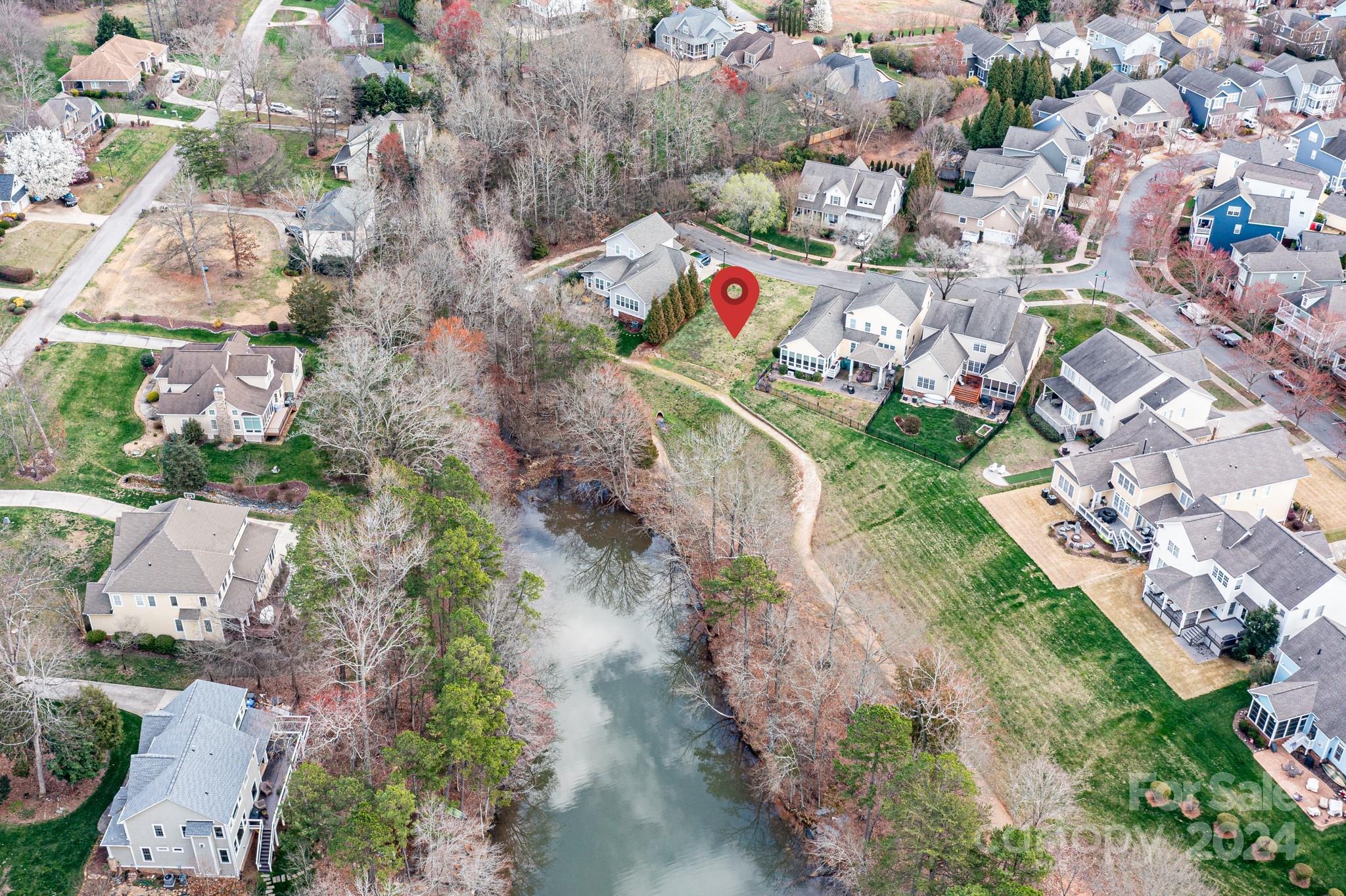 111 Poppy Field Lane Davidson, NC 28115 - Photo 10 of 28 an aerial view of residential houses with outdoor space