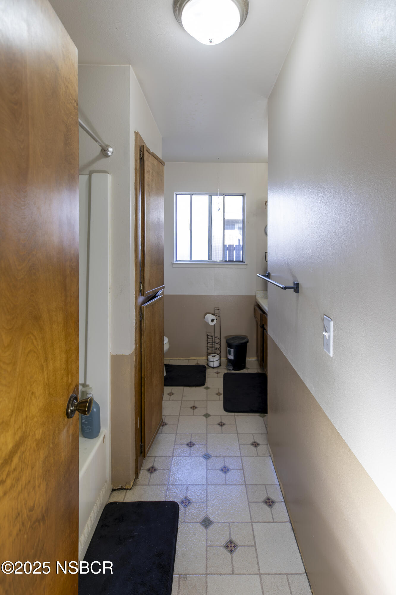 601 North Seventh Street Lompoc, CA 93436 - Photo 11 of 32 a bathroom with a bathtub and a shower
