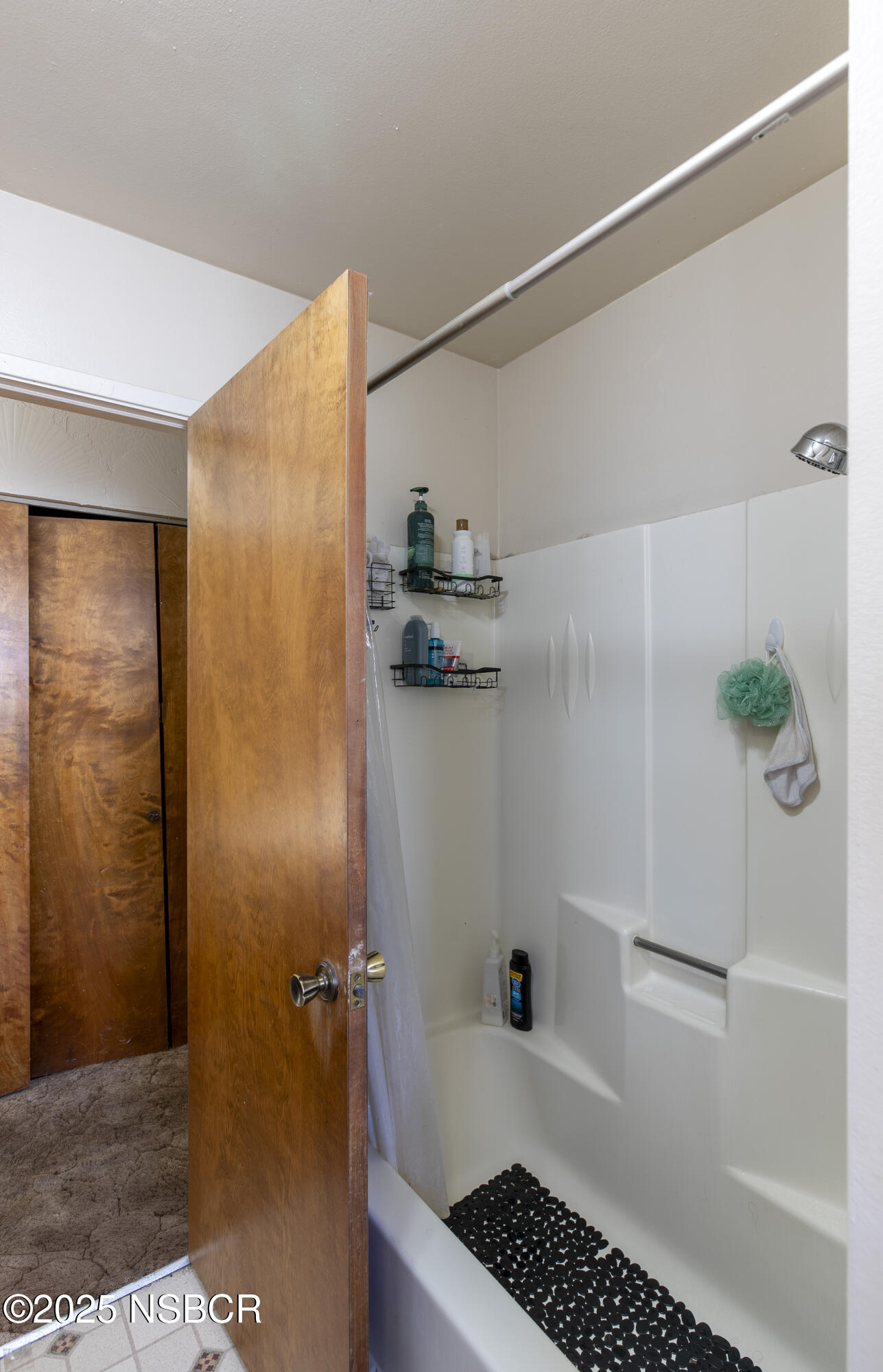 601 North Seventh Street Lompoc, CA 93436 - Photo 14 of 32 a bathroom with a shower and a sink