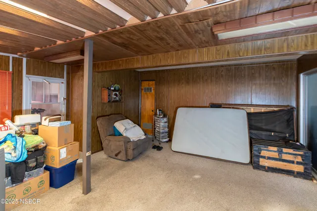 a room with lots of furniture and clutter