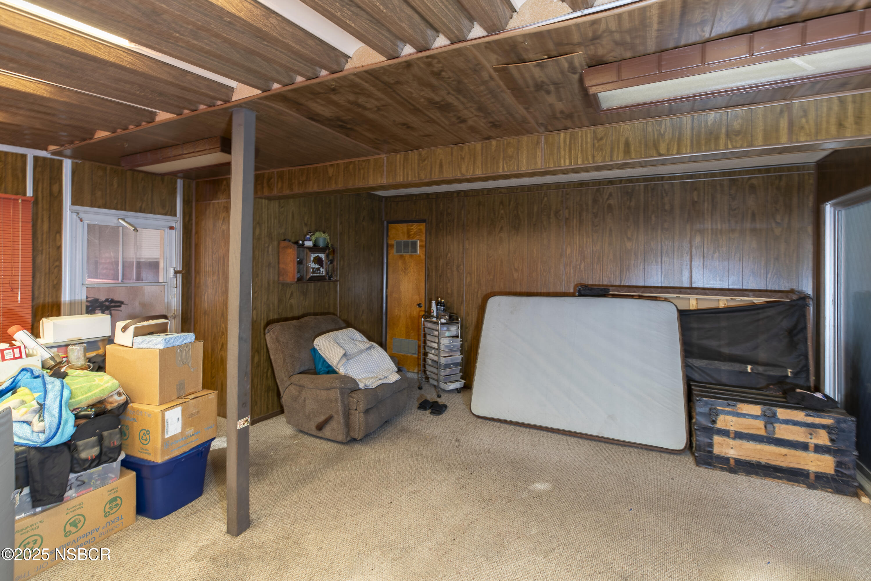 601 North Seventh Street Lompoc, CA 93436 - Photo 22 of 32 a room with furniture and a flat screen tv