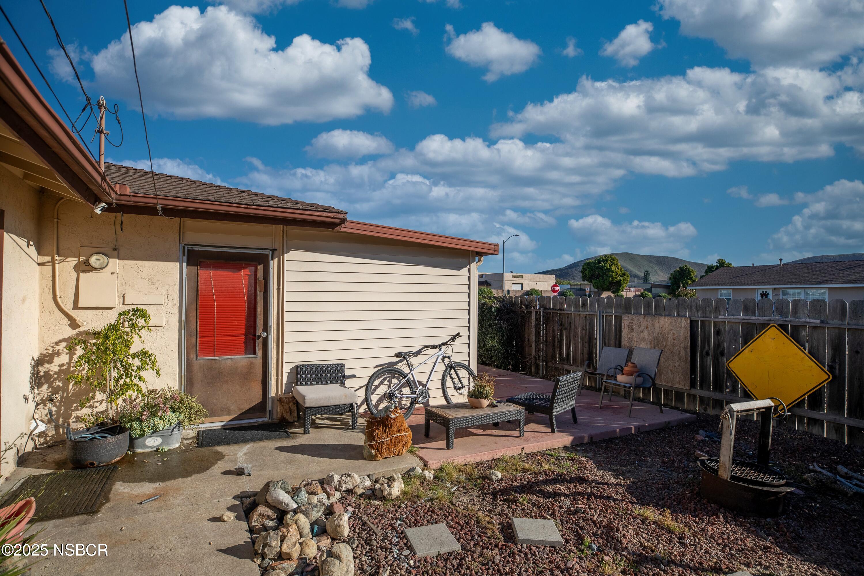 601 North Seventh Street Lompoc, CA 93436 - Photo 26 of 32 a view of a backyard with sitting area and furniture