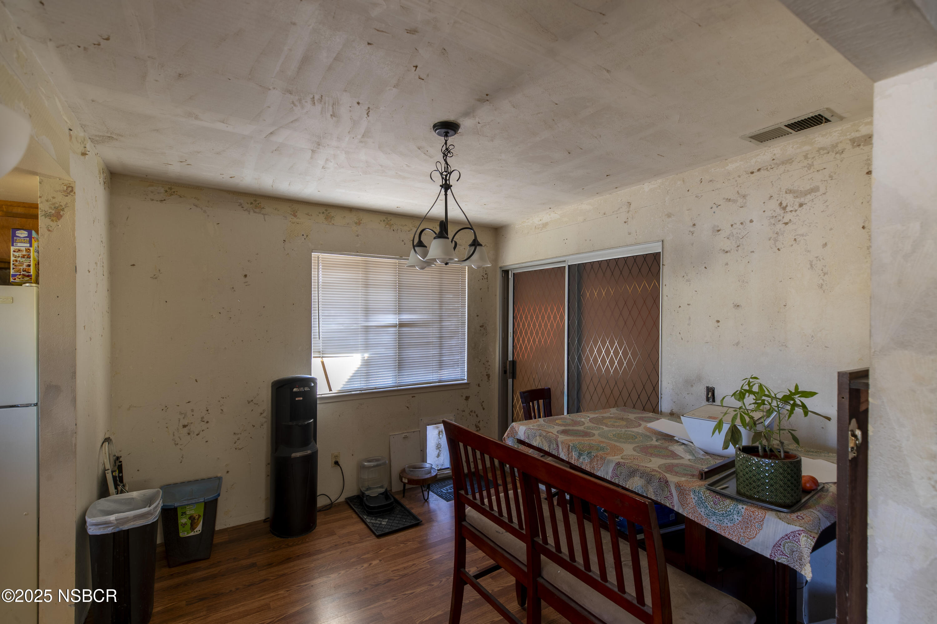 601 North Seventh Street Lompoc, CA 93436 - Photo 4 of 32 a view of a dining room with furniture window and wooden floor