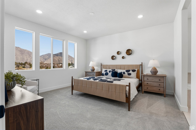 624 North Legend Circle, Unit 480 Mapleton, UT 84664 - Photo 22 of 34 Bedroom with a mountain view, light colored carpet, and recessed lighting