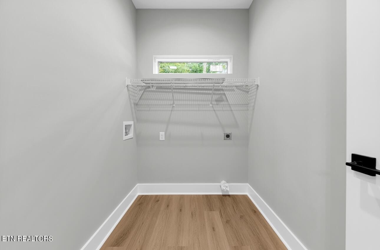 246 Clear Creek Road Kodak, TN 37764 - Photo 16 of 23 a view of a small space with wooden floor and a window