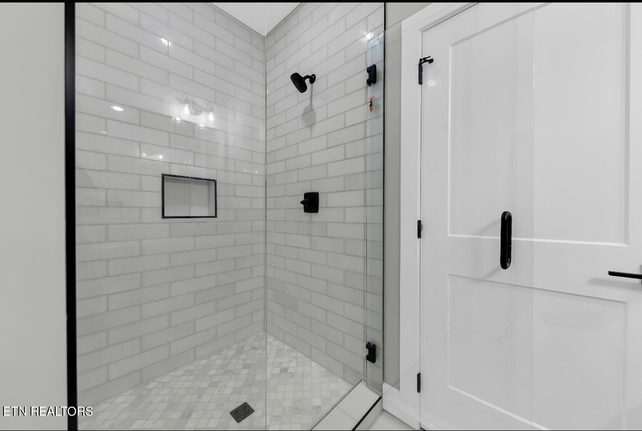 246 Clear Creek Road Kodak, TN 37764 - Photo 20 of 23 a bathroom with a shower