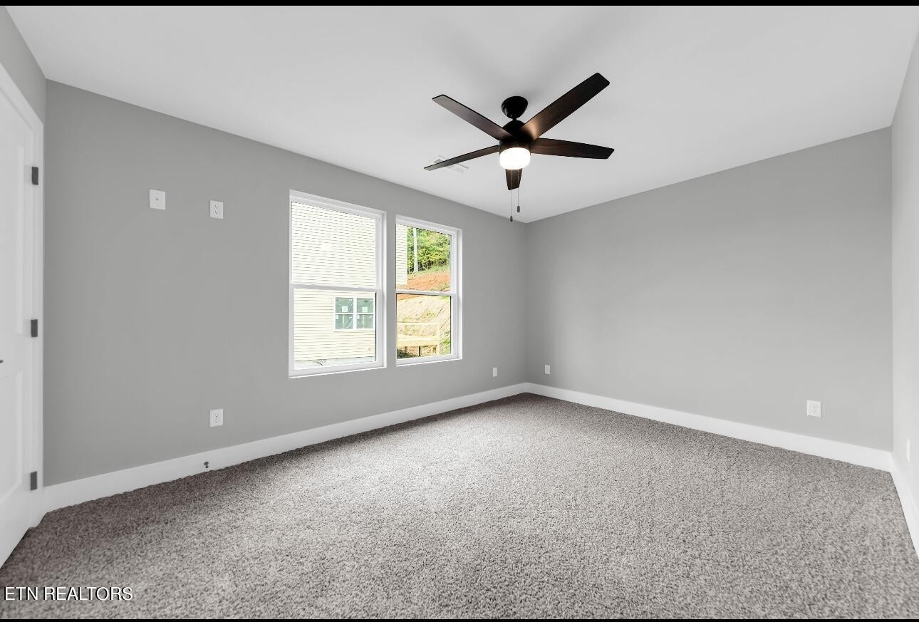 246 Clear Creek Road Kodak, TN 37764 - Photo 21 of 23 a view of an empty room with a window