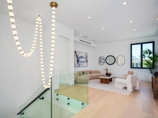 a aerial view of a house with a yard