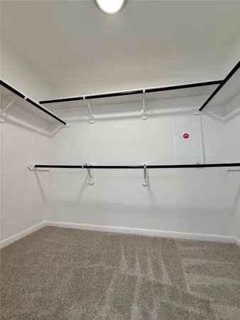 a view of a refrigerator in a kitchen