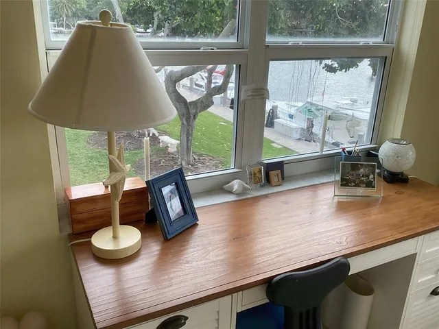 a view of a glass door and a balcony