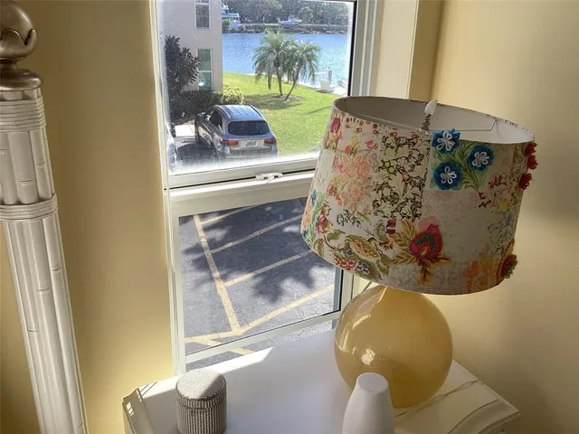 a view of swimming pool with outdoor seating