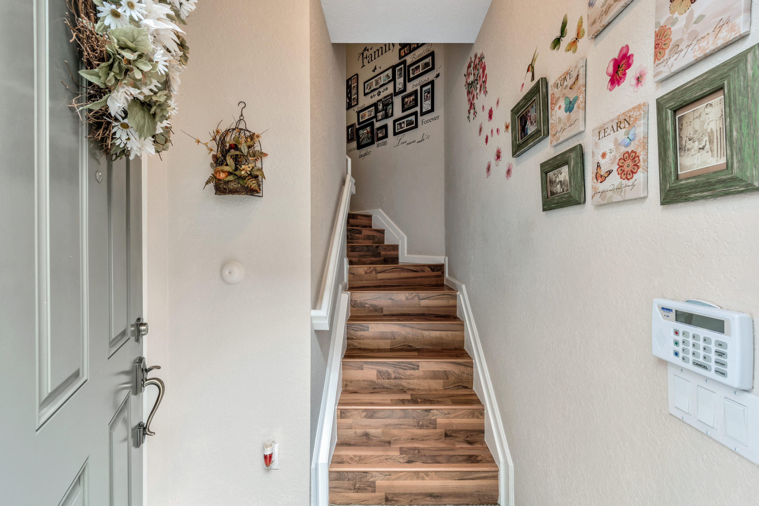 3067 Laurel Ridge Circle Riviera Beach, FL 33404 - Photo 17 of 26 LAMINATE WOOD STAIRS