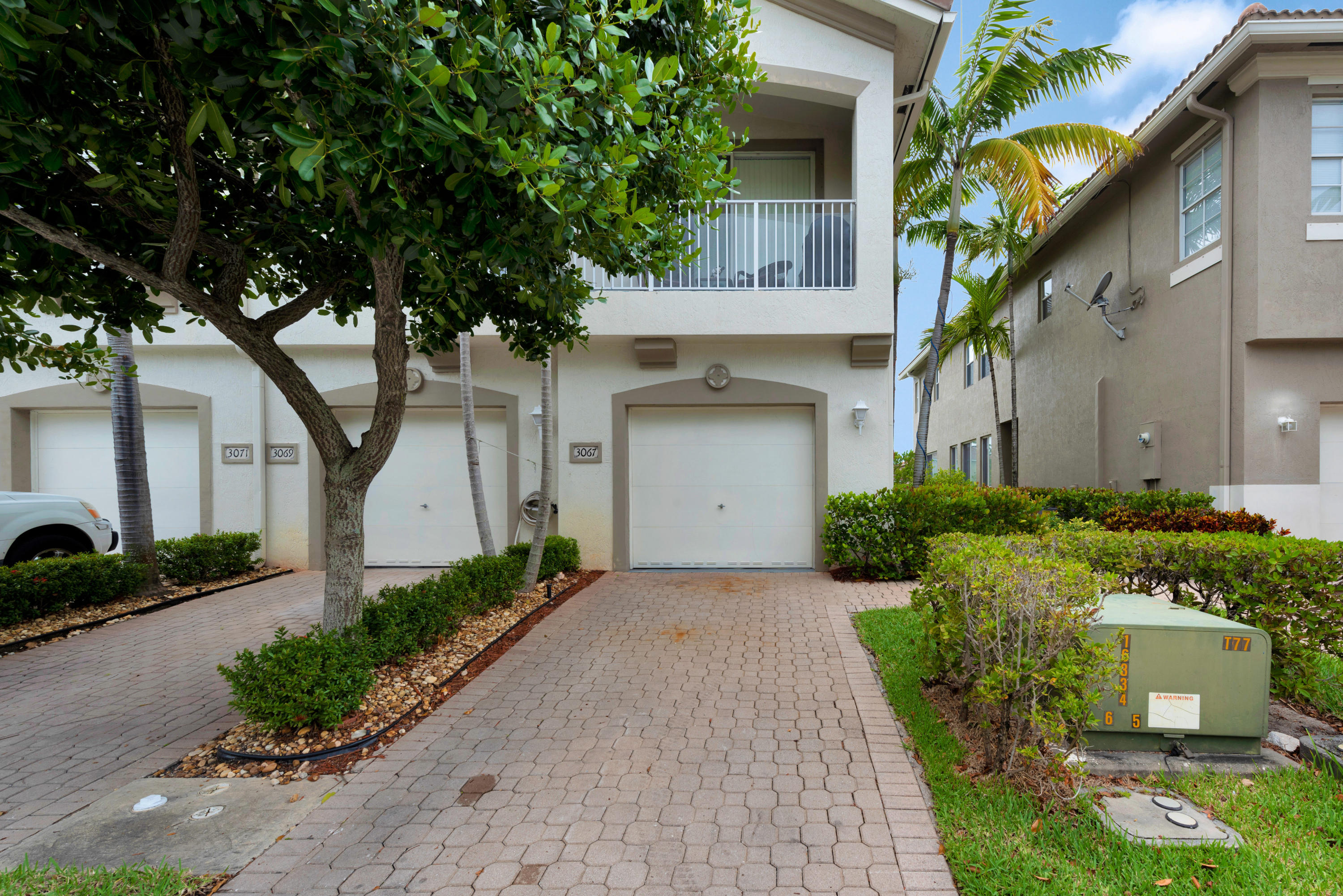 3067 Laurel Ridge Circle Riviera Beach, FL 33404 - Photo 2 of 26 CORNER UNIT