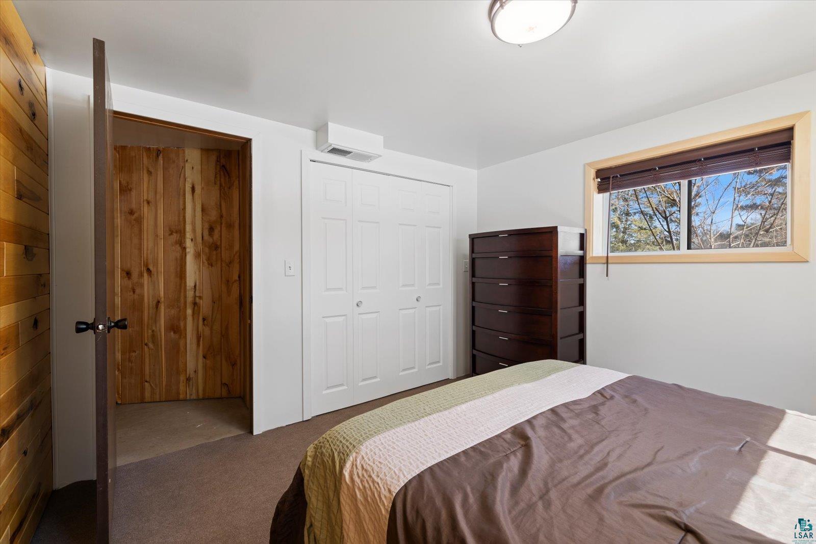 3495 Deer Forest Road Makinen, MN 55763 - Photo 16 of 71 Carpeted bedroom featuring a closet