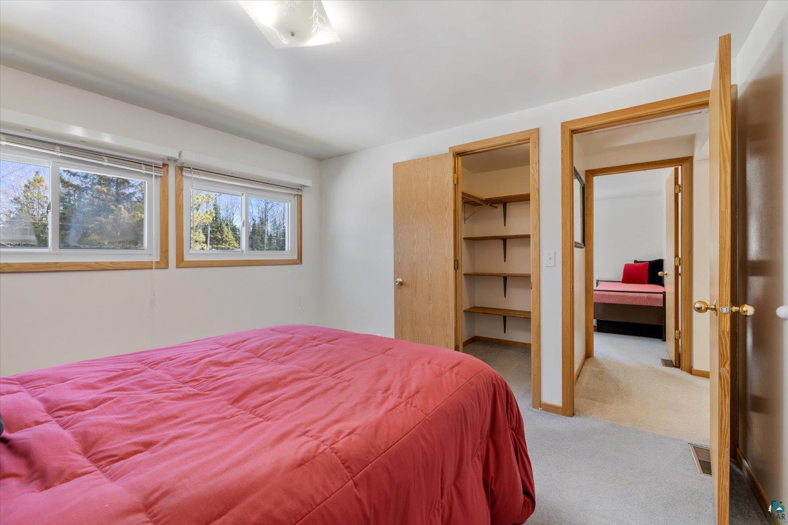 3495 Deer Forest Road Makinen, MN 55763 - Photo 33 of 71 Carpeted bedroom with a spacious closet