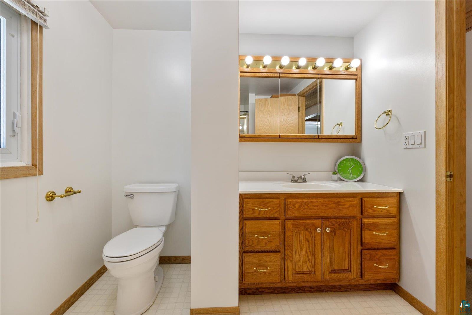 3495 Deer Forest Road Makinen, MN 55763 - Photo 49 of 71 Bathroom featuring vanity and toilet