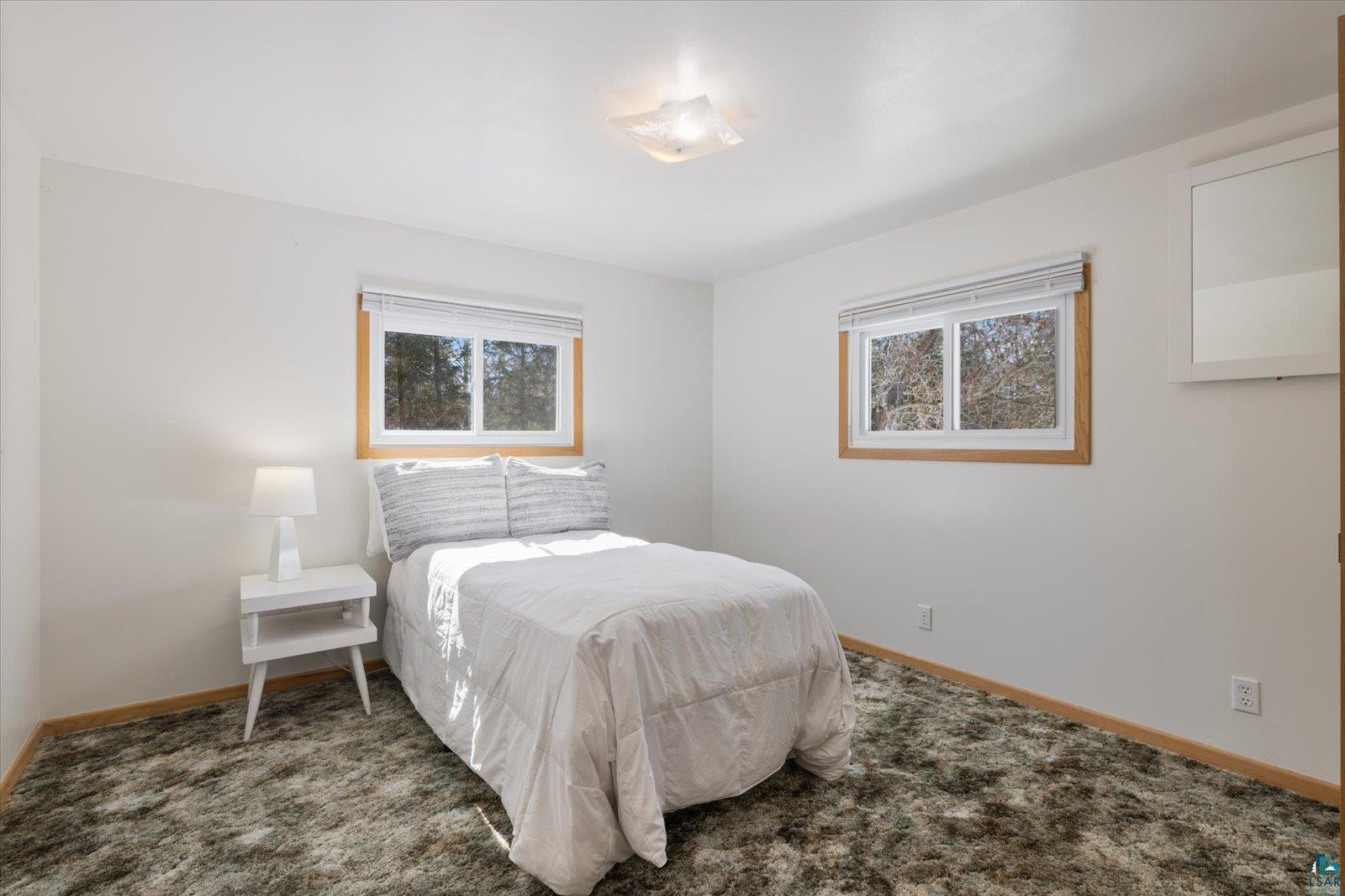 3495 Deer Forest Road Makinen, MN 55763 - Photo 51 of 71 Carpeted bedroom featuring baseboards