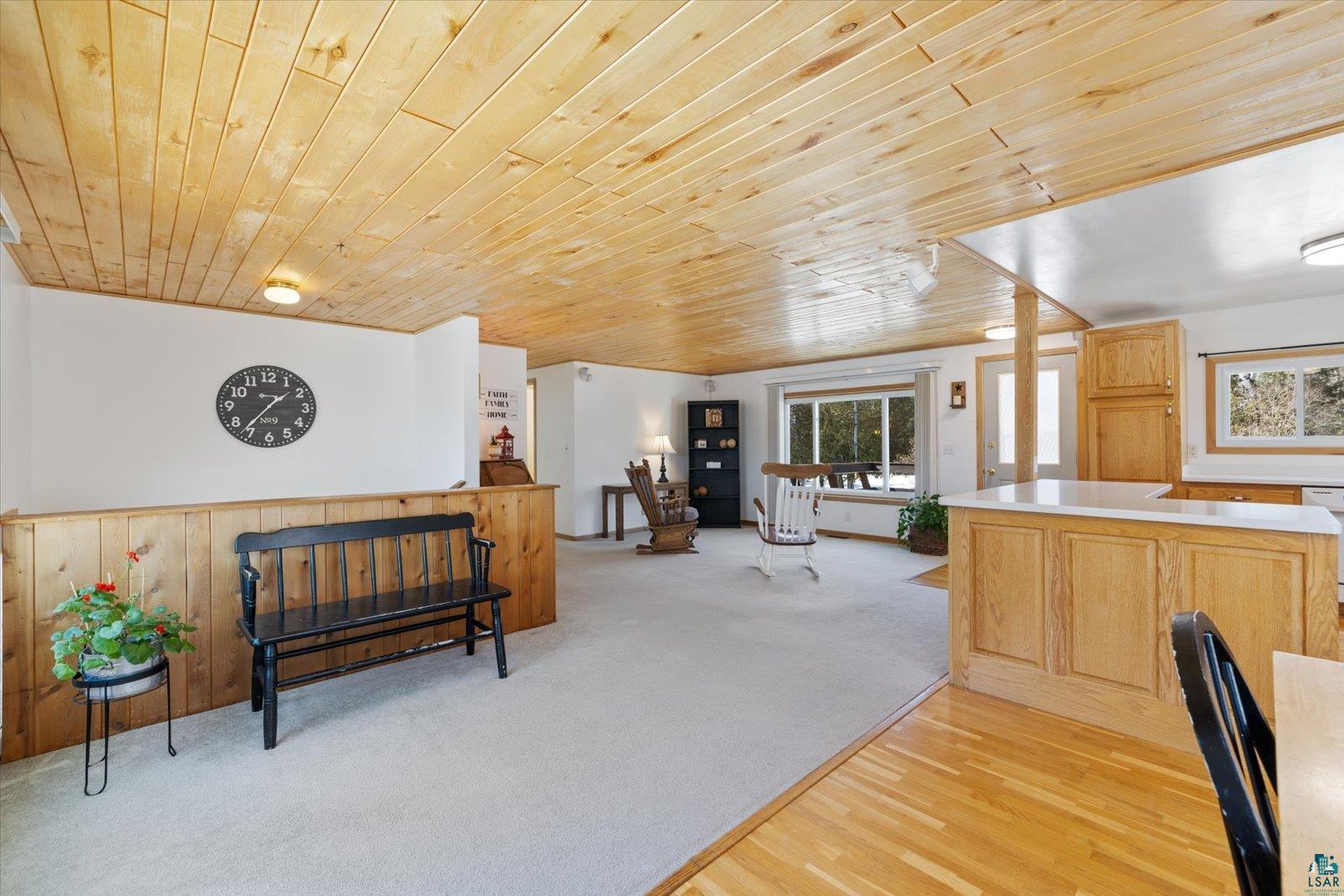 3495 Deer Forest Road Makinen, MN 55763 - Photo 55 of 71 Dining space with wood ceiling, light carpet, and light wood-type flooring