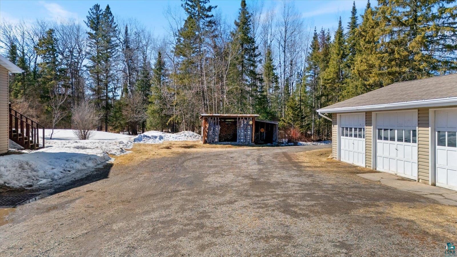 3495 Deer Forest Road Makinen, MN 55763 - Photo 66 of 71 View of yard with an outbuilding and a detached garage