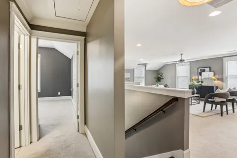 a view of a living room and dining room