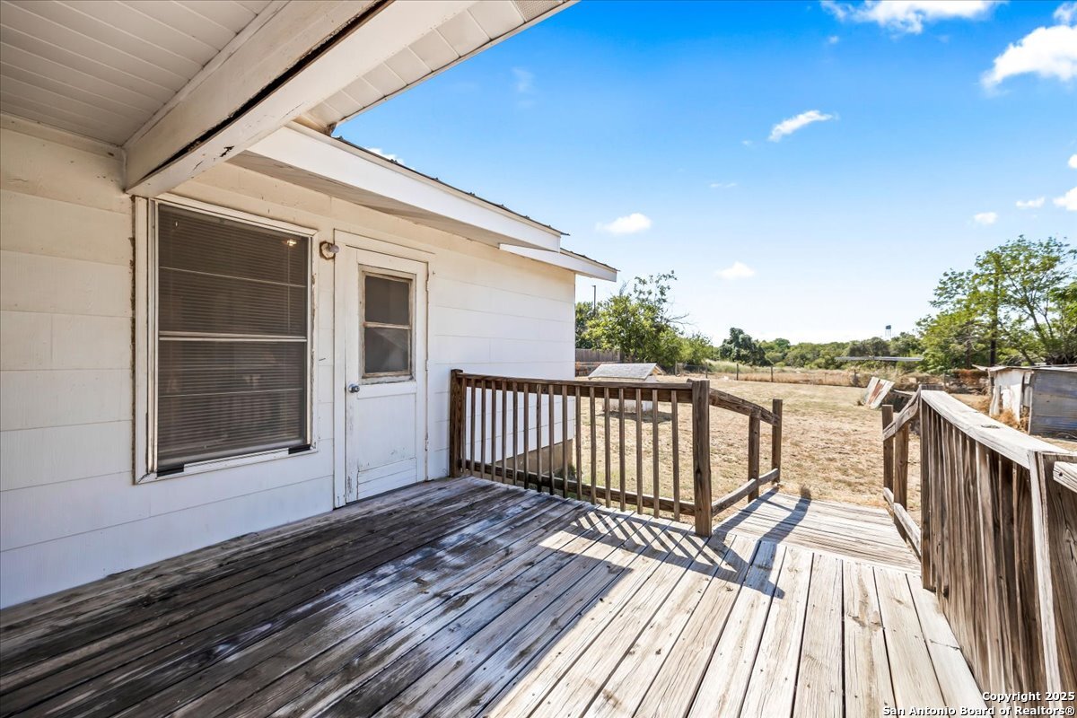 19239 McDonald Street Lytle, TX 78052 - Photo 17 of 29 a view of balcony with wooden floor