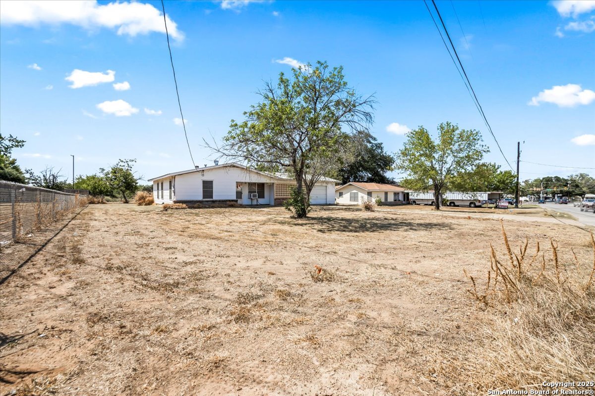 19239 McDonald Street Lytle, TX 78052 - Photo 2 of 29 a house view with a outdoor space