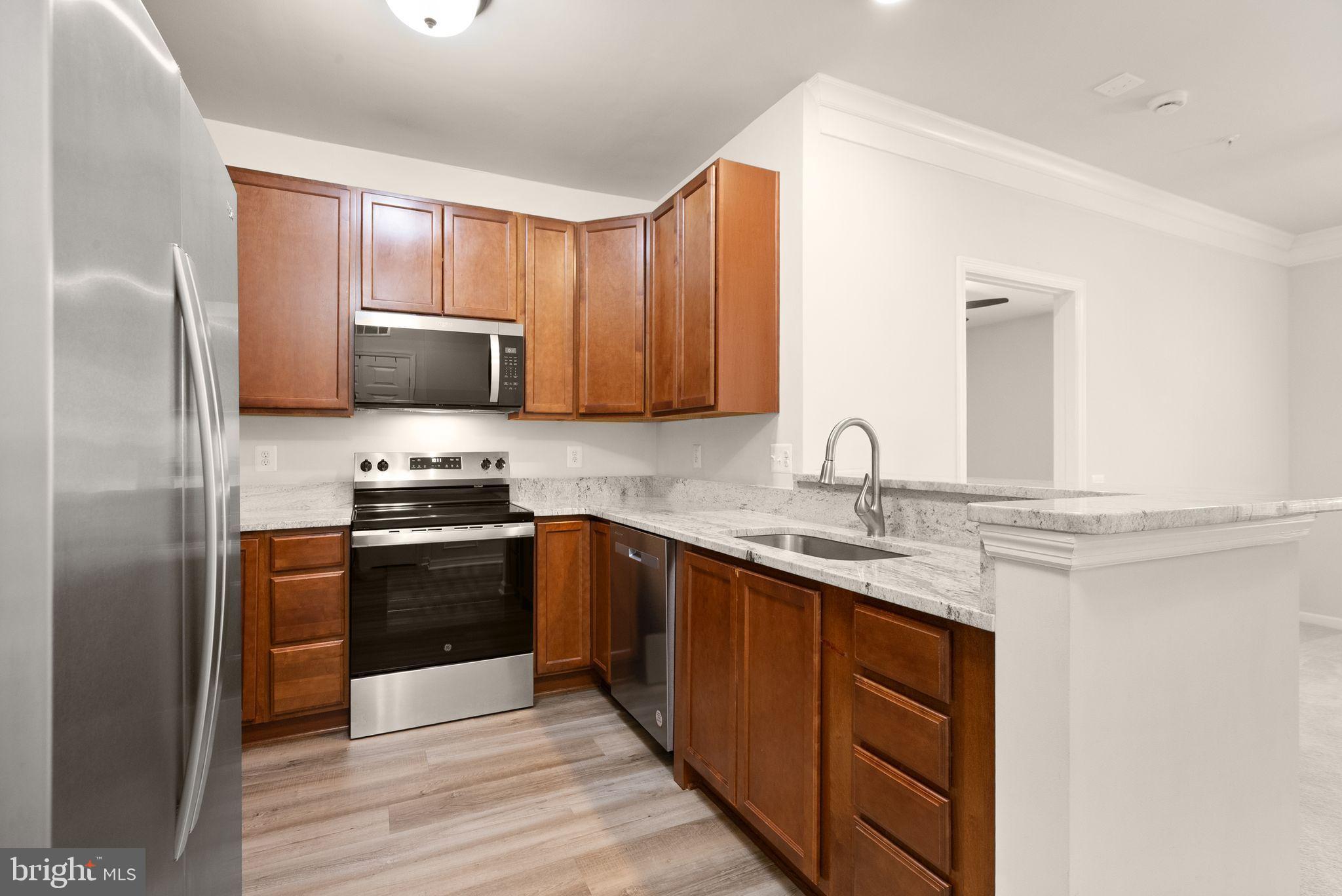 20610 Hope Spring Terrace, Unit 104 Ashburn, VA 20147 - Photo 5 of 38 Modern Kitchen