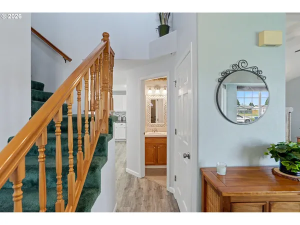 a view of entryway with wooden floor