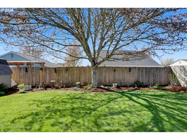 a backyard of a house with lots of green space