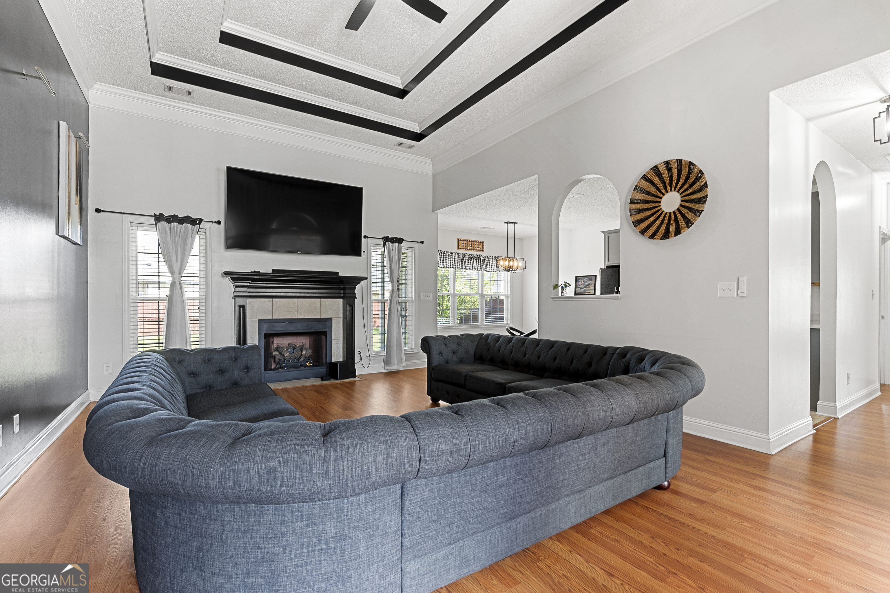 217 Caleb Way Byron, GA 31008 - Photo 12 of 58 a living room with furniture fireplace and flat screen tv