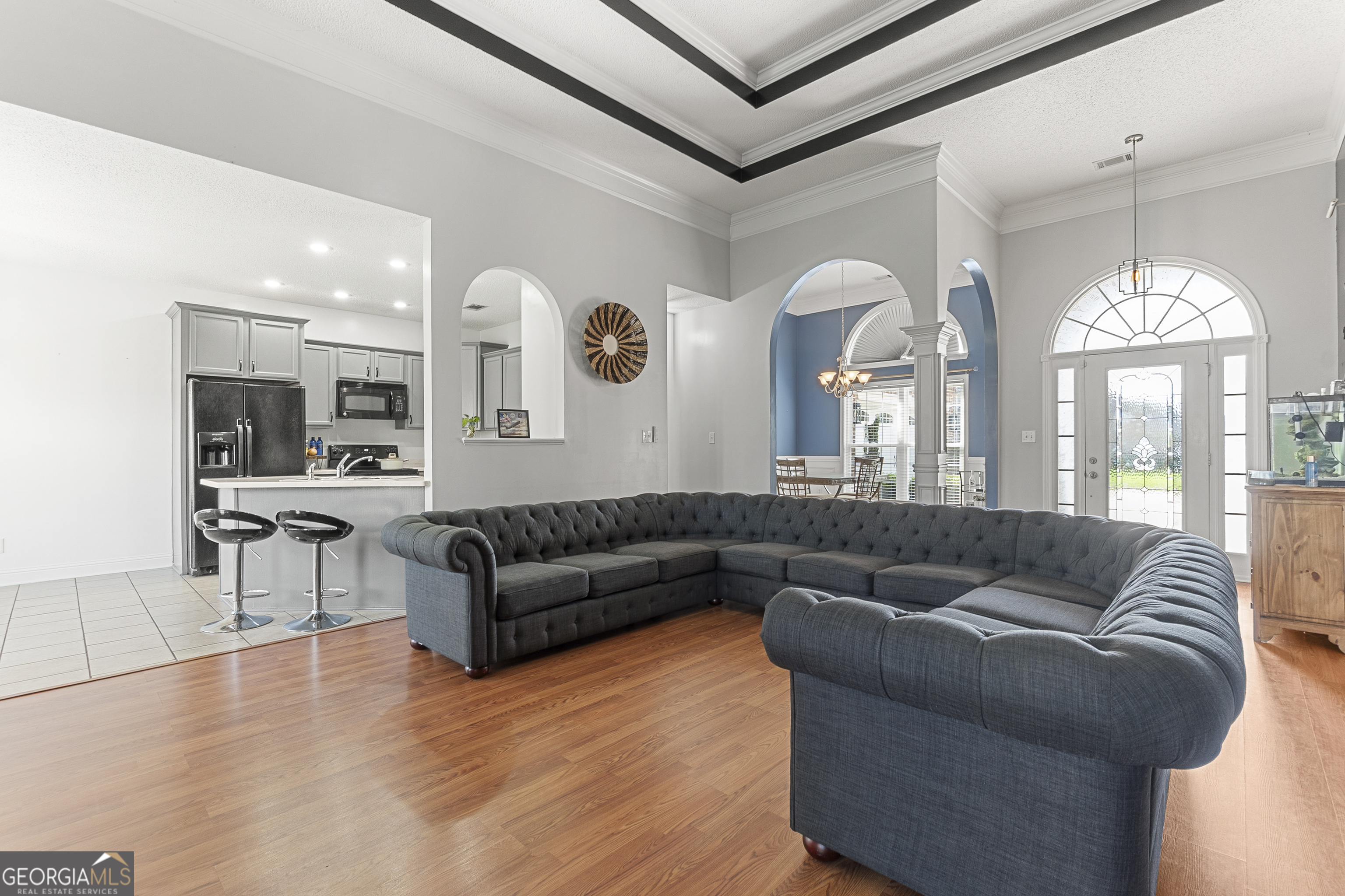 217 Caleb Way Byron, GA 31008 - Photo 15 of 58 a living room with furniture and a large window