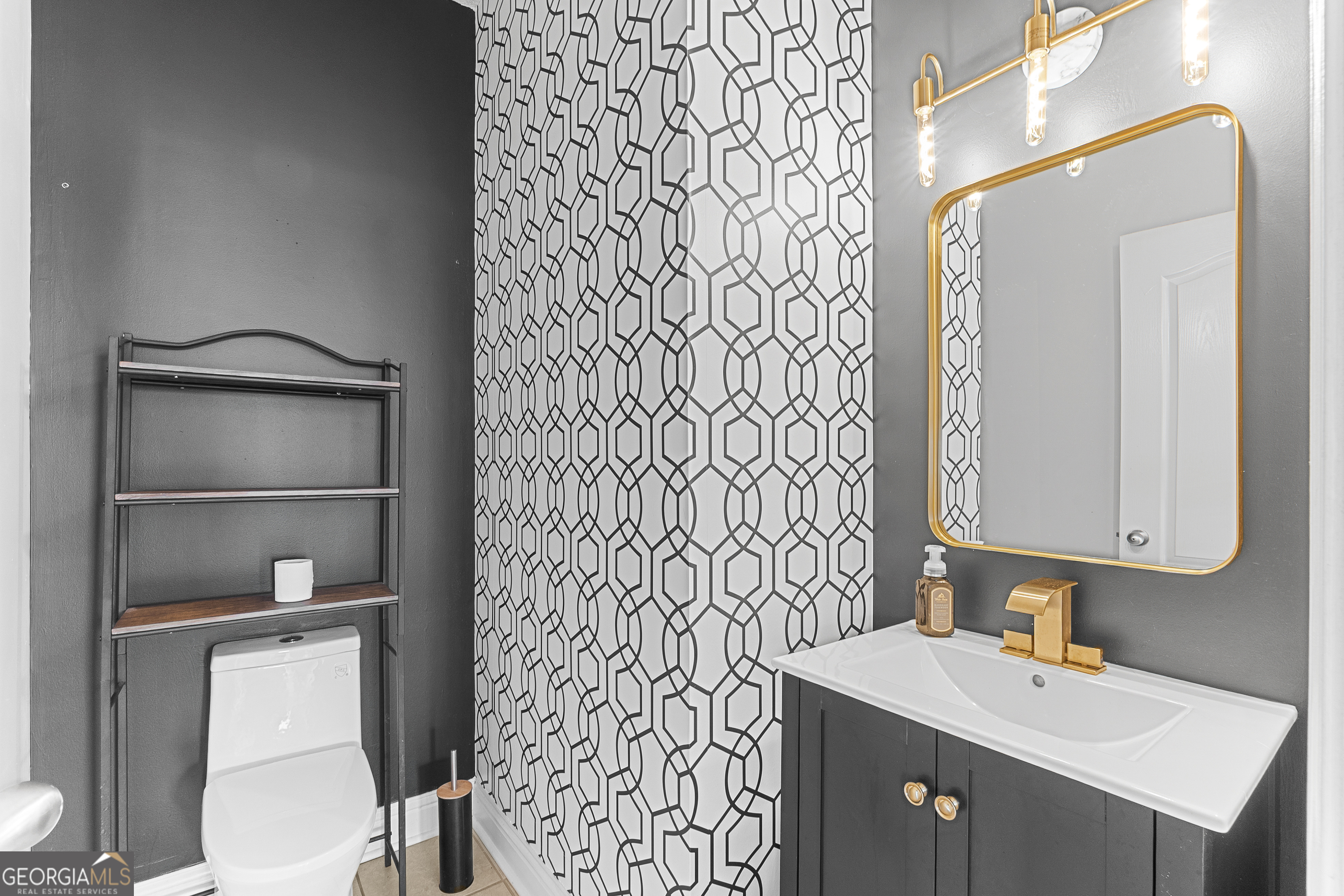 217 Caleb Way Byron, GA 31008 - Photo 24 of 58 a bathroom with a sink a toilet and shower