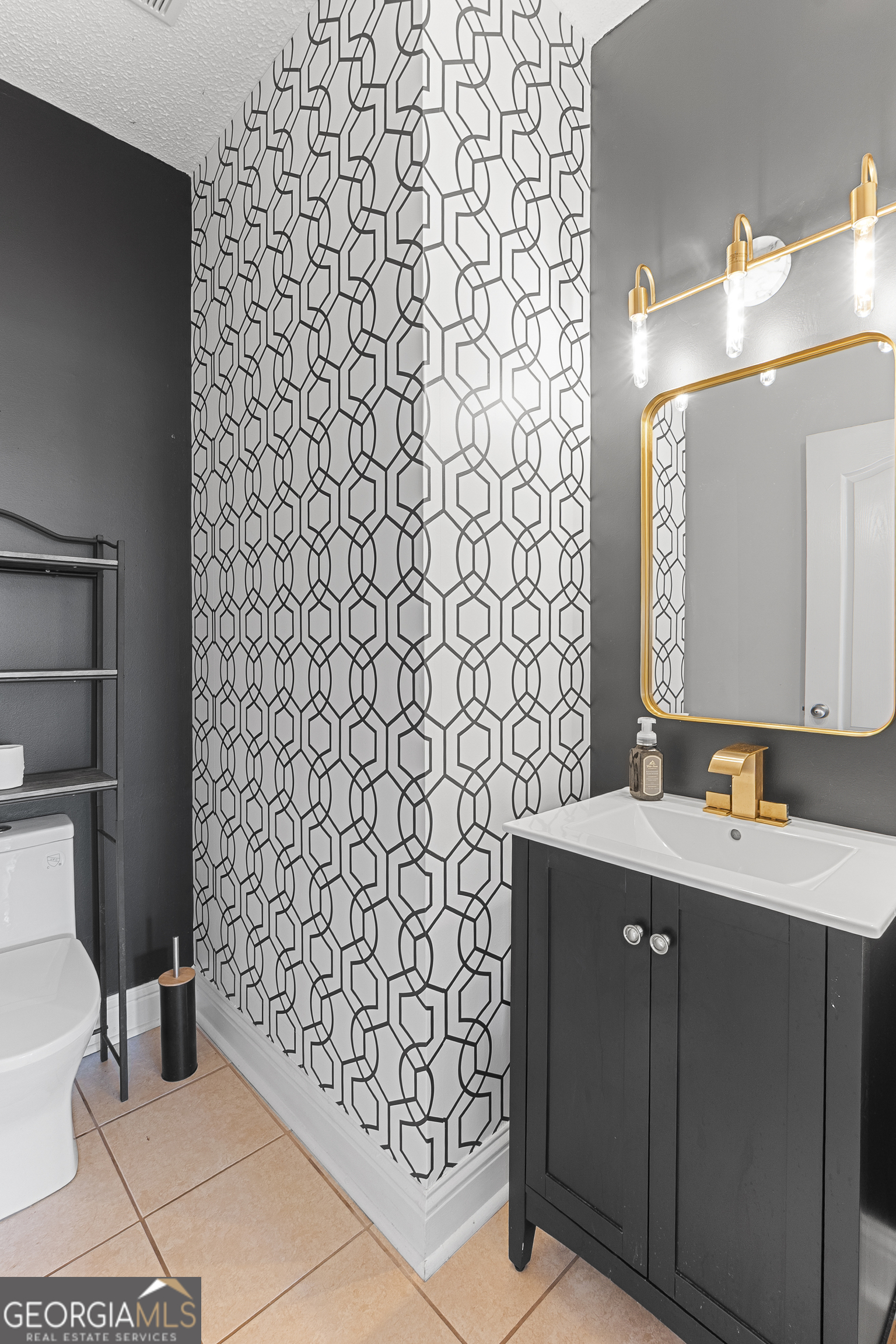 217 Caleb Way Byron, GA 31008 - Photo 25 of 58 a bathroom with a sink toilet and mirror