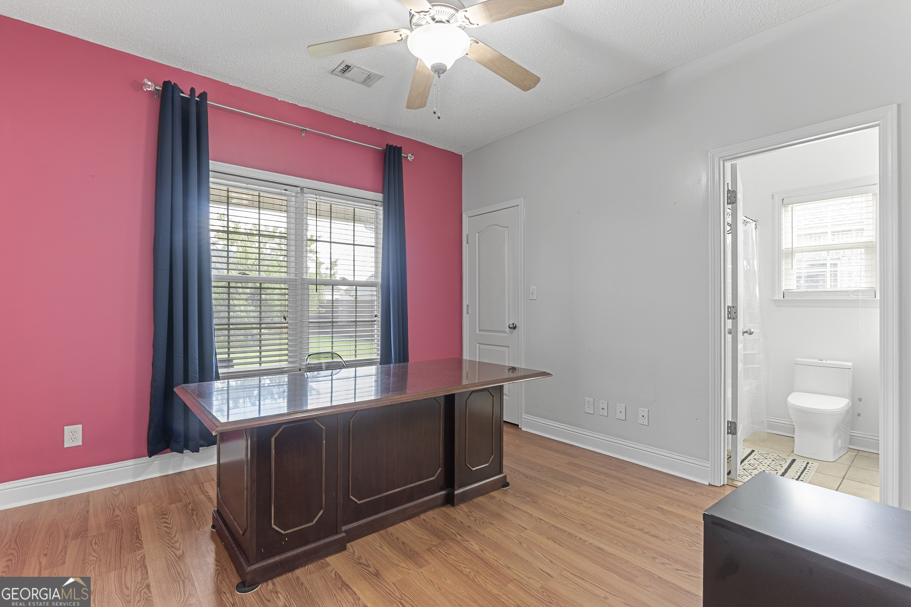 217 Caleb Way Byron, GA 31008 - Photo 37 of 58 a living room with furniture and a window