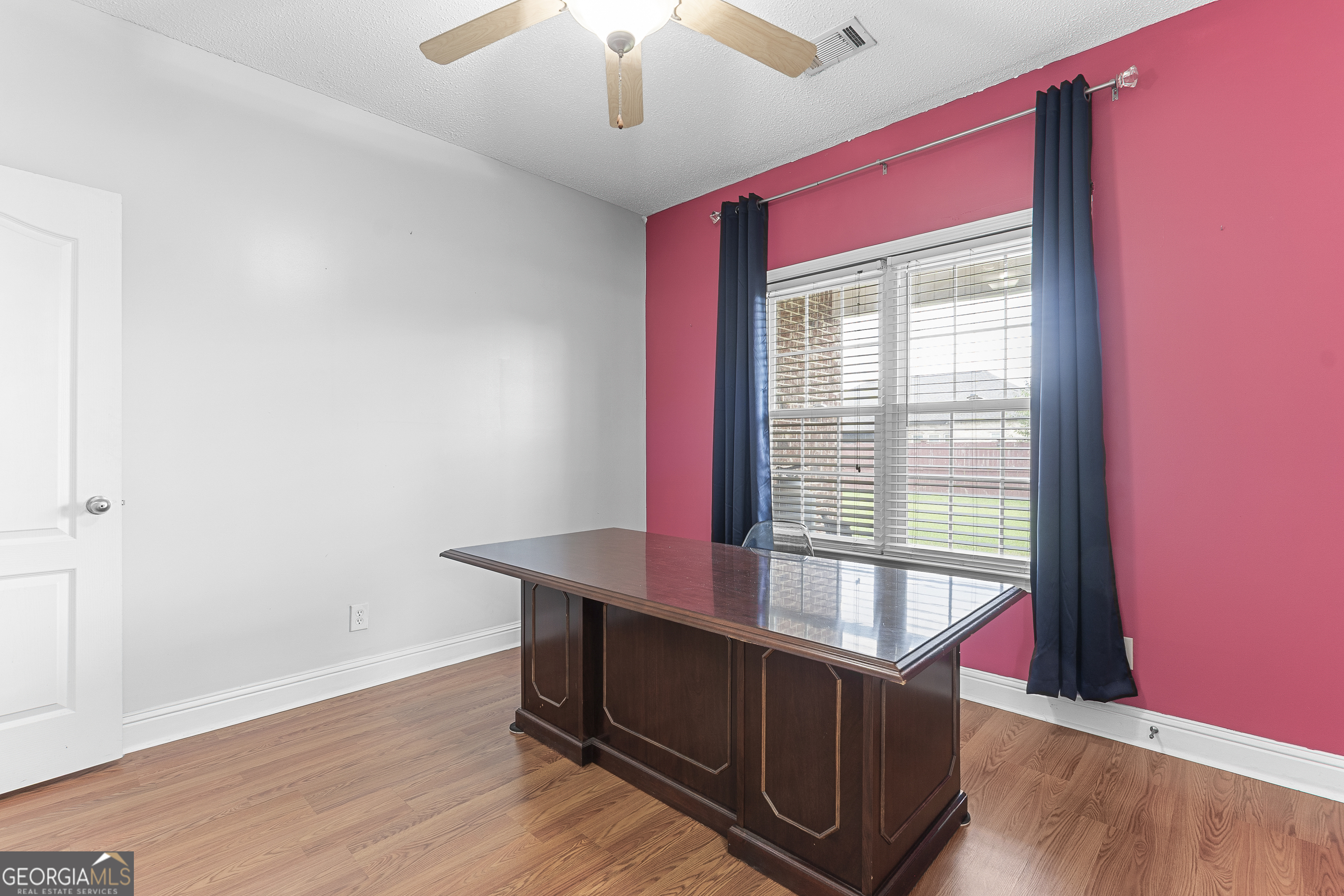 217 Caleb Way Byron, GA 31008 - Photo 39 of 58 a view of workspace with furniture and a window